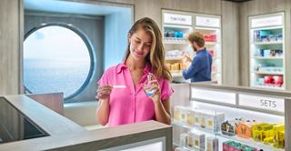 Staff assists guests in the entertainment center aboard the cruise ship | MSC Cruises