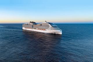 Crew preparing dining tables for evening service | MSC Cruises