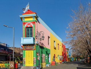 Colorful building and tree in the iconic La Boca district of Buenos Aires, Argentina | MSC Cruises