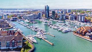 Aerial view of Ocean Village Marina in Southampton, showcasing boats, harbours, and striking skyscrapers | MSC Cruises