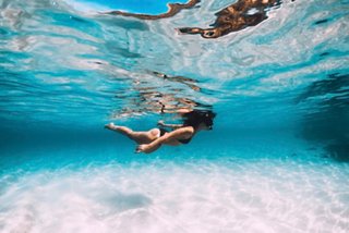 Bahamas, Nassau woman snorkeling