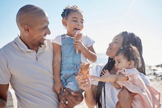 A joyful family enjoying ice cream together at the beach, creating cherished memories in the sun | MSC Cruises