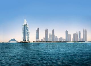 Dubai's skyline surrounded by blue sea and a clear sky | MSC Cruises