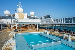 A serene pool area on the MSC Opera, perfect for relaxation and enjoyment under the sun | MSC Cruises