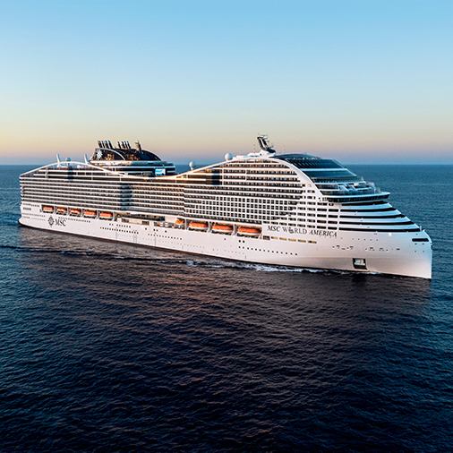 Luxury cruise ship sailing on open sea under clear sky | MSC Cruises