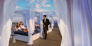 Staff serving guests at the sun deck of MSC Yacht Club | MSC Cruises