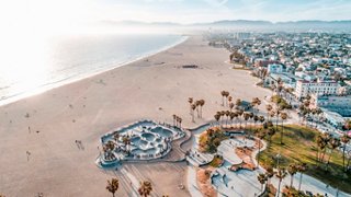 Aerial view of Venice Beach showcasing its vibrant coastline and iconic skatepark along the Californian shore | MSC Cruises
