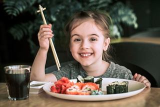 Child dining sushi at the speciality restaurant | MSC Cruises
