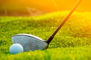 Green grass with a golf club and ball, ready for an outdoor game | MSC Cruises
