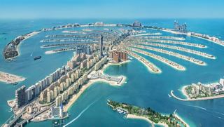 Aerial view of Dubai Marina showcasing the stunning Palm Jumeirah and surrounding architecture | MSC Cruises