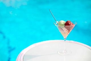 A refreshing gelato served in a crystal bowl next to a pool on MSC Divina | MSC Cruises