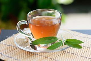 A refreshing cup of herbal tea with sage leaves, inviting relaxation and wellness | MSC Cruises