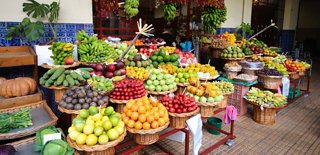 A vibrant display of fresh fruits at Mercado dos Lavradores in Funchal, Portugal, inviting exploration and enjoyment | MSC Cruises