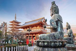 Sensoji Temple in Tokyo with a large Buddha statue in the foreground at dusk | MSC Cruises