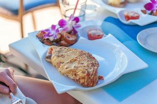 A plate filled with a colorful assortment of food | MSC Cruises