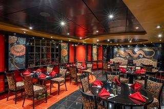 A lively restaurant setting with tables and chairs, inviting guests to enjoy a delightful dining experience | MSC Cruises