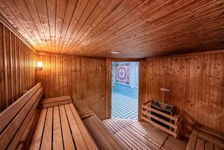 A serene sauna interior with warm wood tones inviting relaxation and rejuvenation | MSC Cruises