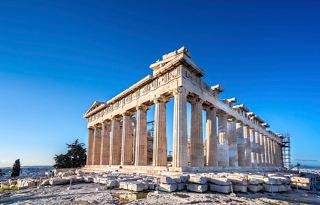 The Acropolis stands majestically under a clear blue sky in Athens, Greece, symbolising ancient heritage | MSC Cruises