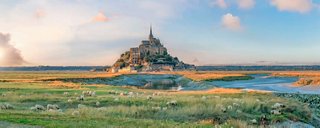 Island in France with field, sheep and mountains under blue sky in Northern Europe | MSC Cruises