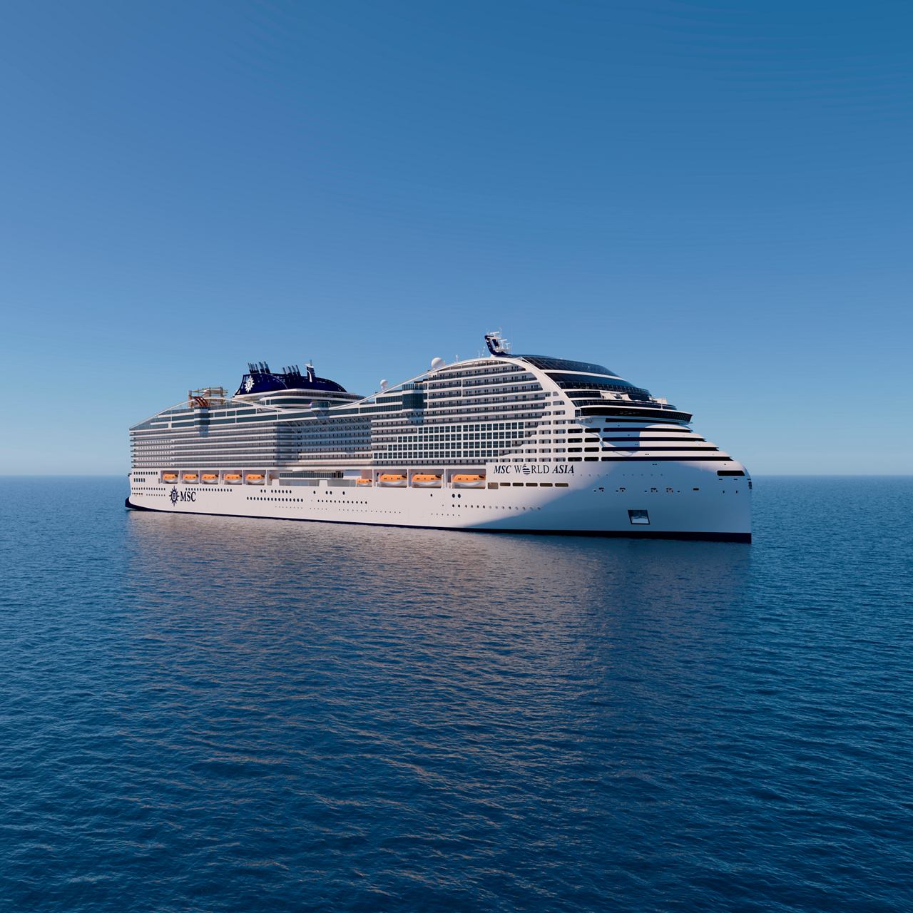 Vue aérienne du MSC World Asia naviguant sur des eaux calmes sous un ciel dégagé | MSC Cruises