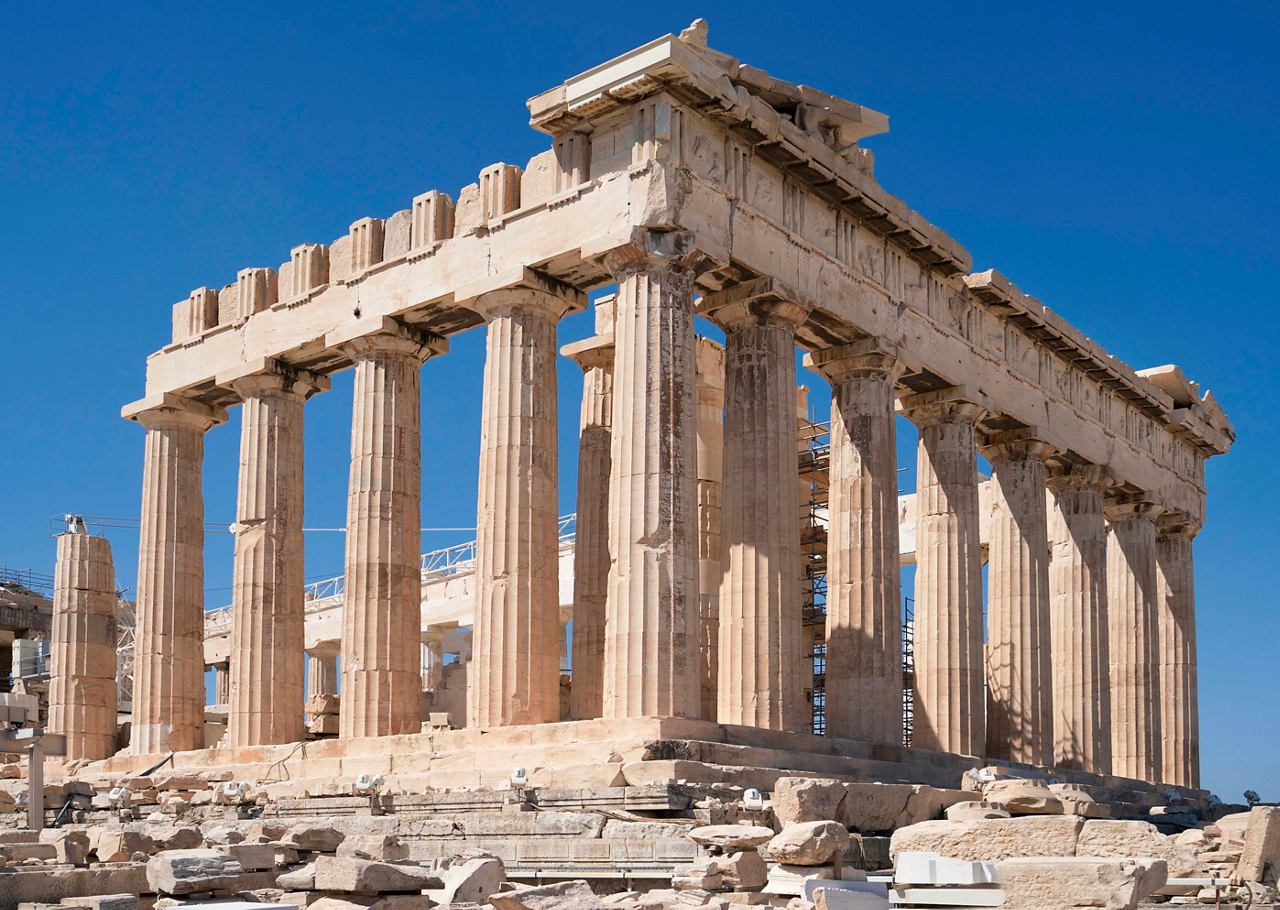The majestic Parthenon stands proudly as a symbol of ancient Greece against a clear blue sky | MSC Cruises