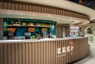 A vibrant juice bar offering a selection of refreshing beverages aboard MSC World Asia | MSC Cruises