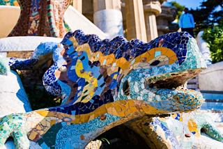 A vibrant mosaic dragon sculpture at Parc Güell, reflecting the artistic spirit of Barcelona's Mediterranean landscape | MSC Cruises