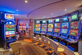 Experience the vibrant atmosphere of the Las Vegas-style casino with numerous slot machines ready for play | MSC Cruises
