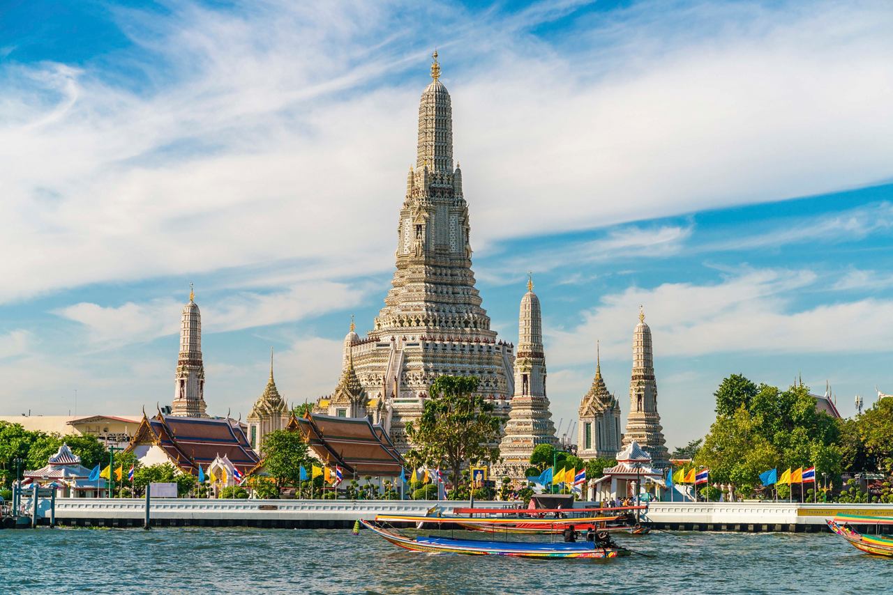 Wat Arun Temple stands majestically by the Chao Phraya River, symbolising Bangkok's architectural beauty | MSC Cruises