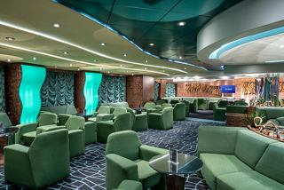 A stylish lounge area featuring comfortable seating and vibrant decor, perfect for relaxation and socialising | MSC Cruises