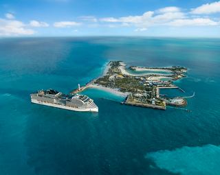 An aerial view of MSC World America near Ocean Cay MSC Marine Reserve, showcasing the vibrant Bahamas landscape | MSC Cruises