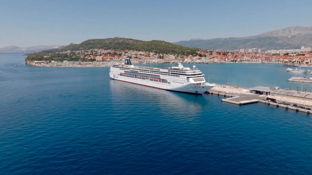 The MSC Sinfonia docked in Split, Croatia, surrounded by serene sea and scenic coastal views | MSC Cruises