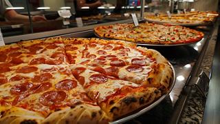 Delicious pizzas served fresh at Il Patio on MSC Opera, inviting guests to enjoy a delightful dining experience | MSC Cruises