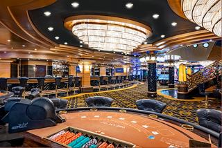 The vibrant Royal Palm Casino on MSC Splendida, featuring a stylish bar area and inviting seating for relaxation | MSC Cruises