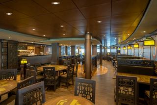 A stylish and inviting dining area with tables and seating, perfect for enjoying meals on board | MSC Cruises