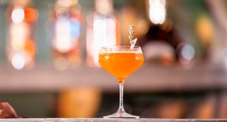 A vibrant cocktail served in a stylish glass at the Splendida Bar, ready to enhance your cruising experience | MSC Cruises