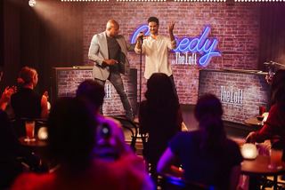 Guests enjoying a live comedy performance at The Loft on MSC World America | MSC Cruises