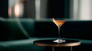 A close-up of a creamy cocktail in a martini glass on a stylish table in the Sky Lounge of MSC Euribia | MSC Cruises