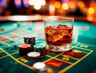 A close-up view of a whiskey glass and chips on a casino table, inviting excitement and leisure | MSC Cruises