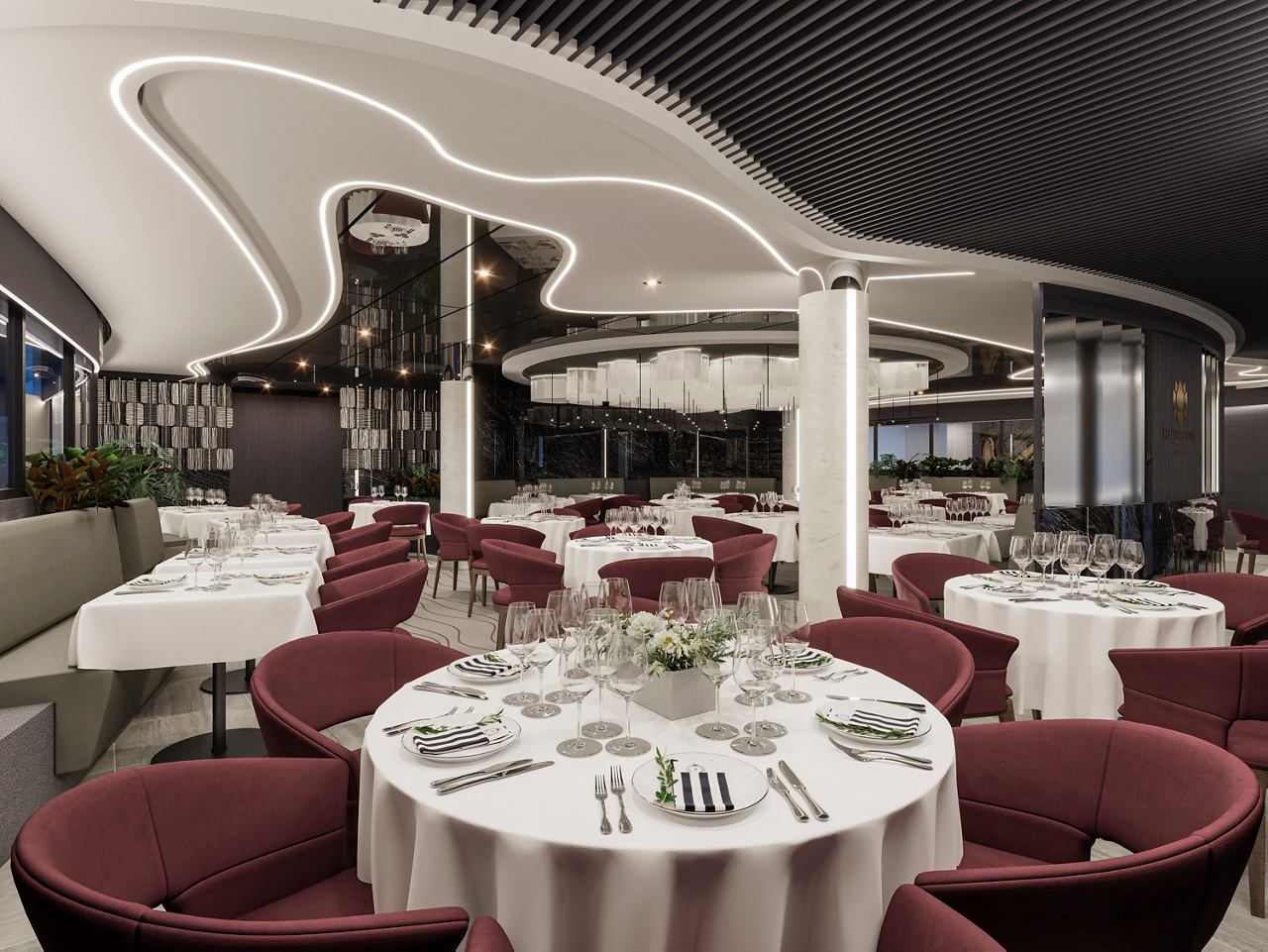 Elegant dining setup in the MSC Yacht Club Restaurant with round tables and a stylish interior | MSC Cruises
