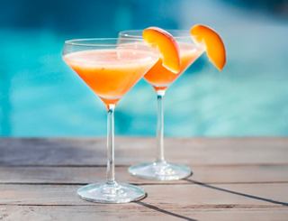 Refreshing cocktails served by the pool with vibrant garnishes, inviting relaxation and enjoyment | MSC Cruises