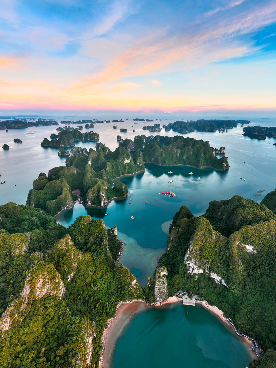 Aerial view of Ha Long Bay featuring green islands and blue waters | MSC Cruises