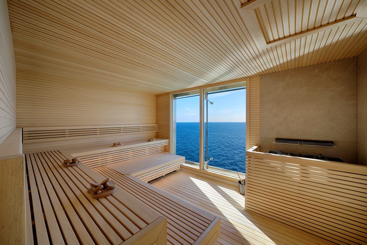 Gemütliches Interieur mit Panoramablick auf das Meer im MSC Aurea Spa | MSC Cruises