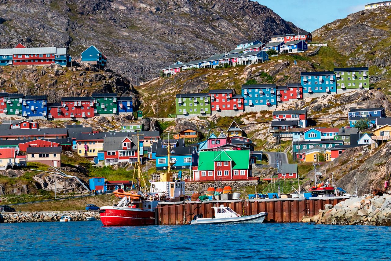 Colorful houses in the picturesque harbor area of Qaqortoq, Greenland | MSC Cruises