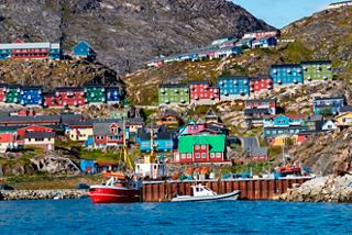 Colorful houses in the picturesque harbor area of Qaqortoq, Greenland | MSC Cruises