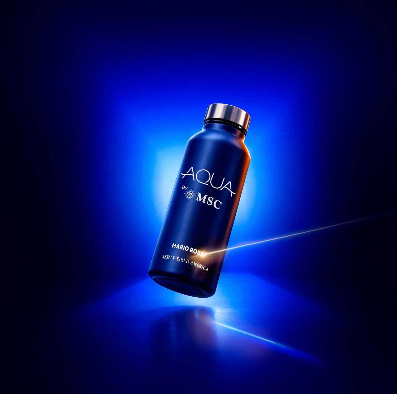 Stylish water bottle illuminated by blue light, symbolizing freshness and innovation | MSC Cruises