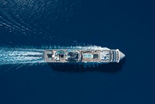 Aerial view of the bow and funnel of MSC World Europa ship at sea | MSC Cruises