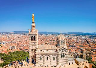 View of Marseille and Notre-Dame de la Garde basilica in France by the Mediterranean Sea | MSC Cruises