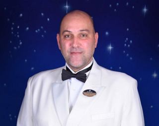 Portrait of officer in white uniform aboard MSC ship | MSC Cruises