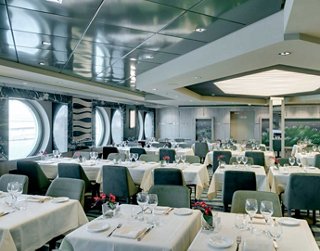 Modern restaurant setting featuring comfortable tables and stylish decor | MSC Cruises